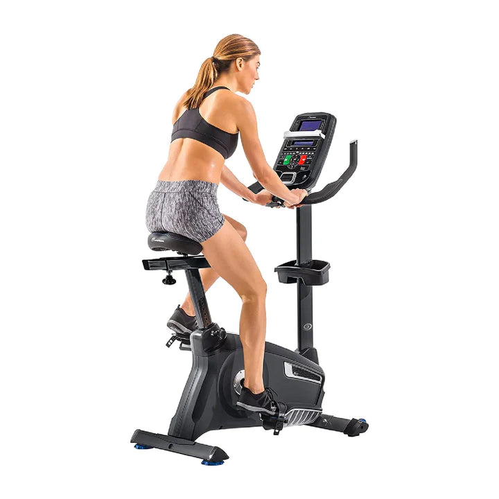 Nautilus U618 Upright Bike Female Action View