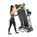 Spirit XT485ENT Treadmill w10.1 Touchscreen folding action shot